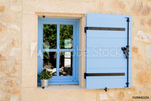 Picture of blue old window in traditional french provence architecture